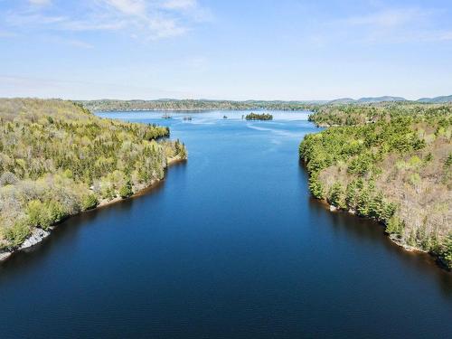 Bord de l'eau - 145 Ch. L'Heureux, Lac-Sainte-Marie, QC - Outdoor With Body Of Water With View