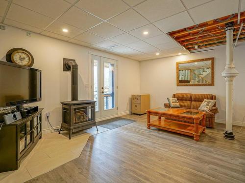 Salle familiale - 2780 Rue Du Manège, Hatley - Canton, QC - Indoor With Fireplace