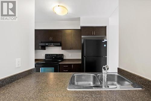 1210 - 61 Heintzman Street, Toronto, ON - Indoor Photo Showing Kitchen With Double Sink