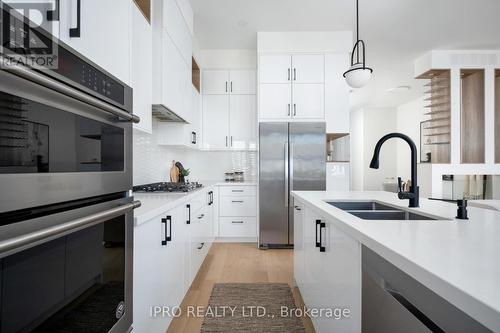18 Crewe Avenue, Toronto, ON - Indoor Photo Showing Kitchen With Stainless Steel Kitchen With Double Sink With Upgraded Kitchen