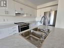 152 Sailors Landing, Clarington, ON  - Indoor Photo Showing Kitchen With Stainless Steel Kitchen With Double Sink 