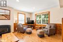 1033 Carnegie Lane Unit# D, Haliburton, ON  - Indoor Photo Showing Living Room With Fireplace 