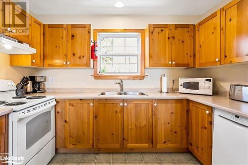 1033 Carnegie Lane Unit# D, Haliburton, ON - Indoor Photo Showing Kitchen With Double Sink