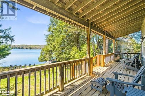 1033 Carnegie Lane Unit# D, Haliburton, ON - Outdoor With Body Of Water With Deck Patio Veranda With Exterior