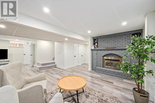 905 Wellingsboro Road E, London, ON - Indoor Photo Showing Living Room With Fireplace