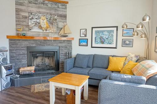 E - 1680 Sinclair Avenue, Windermere, BC - Indoor Photo Showing Living Room With Fireplace