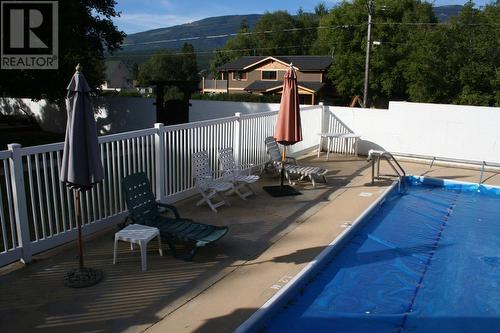 1680 Sinclair  Avenue Unit# E, Windermere, BC - Outdoor With In Ground Pool