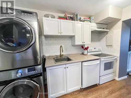 812 - 350 Quigley Road, Hamilton, ON - Indoor Photo Showing Laundry Room