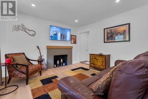 83 Dorchester Drive, Grimsby, ON - Indoor Photo Showing Living Room With Fireplace