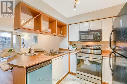1212 - 4080 Living Arts Drive, Mississauga, ON - Indoor Photo Showing Kitchen With Double Sink