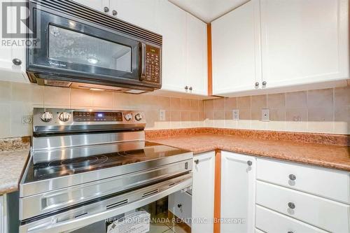 1212 - 4080 Living Arts Drive, Mississauga, ON - Indoor Photo Showing Kitchen
