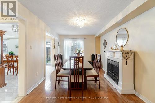 138 Yuile Court, Brampton, ON - Indoor Photo Showing Dining Room With Fireplace