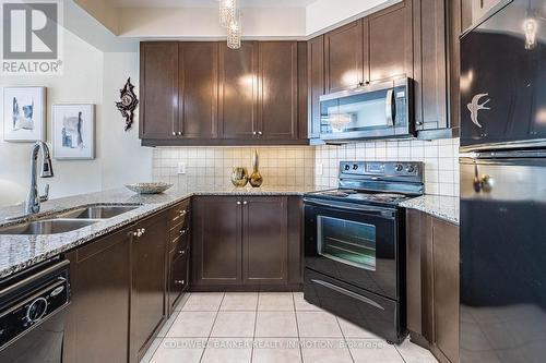 1304 - 80 Absolute Avenue, Mississauga, ON - Indoor Photo Showing Kitchen With Double Sink With Upgraded Kitchen
