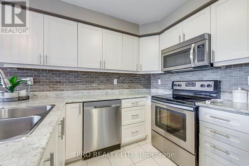 1699 Copeland Circle, Milton, ON - Indoor Photo Showing Kitchen With Double Sink With Upgraded Kitchen