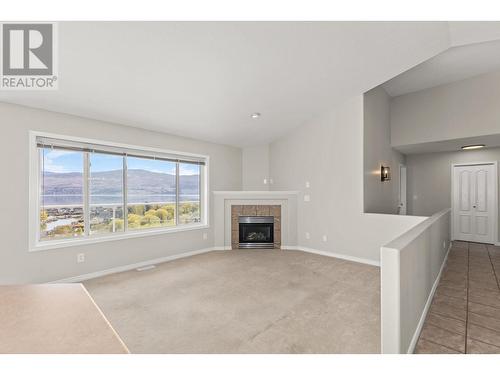 3513 Empire Place, West Kelowna, BC - Indoor Photo Showing Other Room With Fireplace