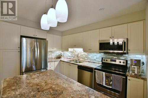 126 - 42 Conservation Way, Collingwood, ON - Indoor Photo Showing Kitchen With Double Sink With Upgraded Kitchen