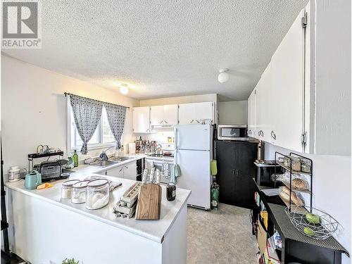 4130 Rainbow Drive, Prince George, BC - Indoor Photo Showing Kitchen With Double Sink