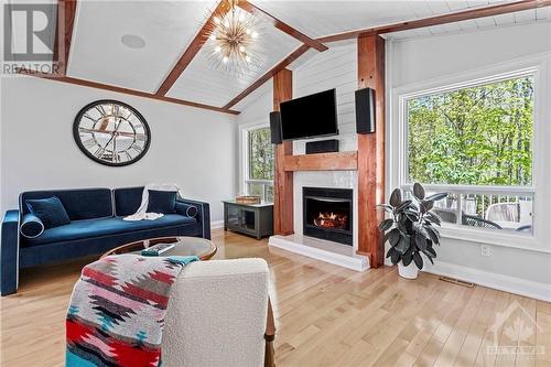 2207 Nature Trail Crescent, Ottawa, ON - Indoor Photo Showing Living Room With Fireplace