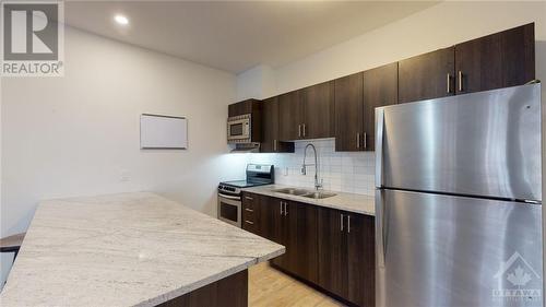 422/424 Nelson Street, Ottawa, ON - Indoor Photo Showing Kitchen With Double Sink