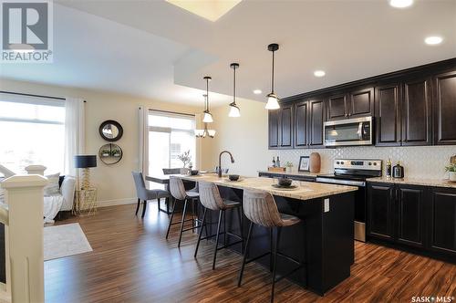 222 Schmeiser Bend, Saskatoon, SK - Indoor Photo Showing Kitchen With Stainless Steel Kitchen With Upgraded Kitchen