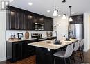 222 Schmeiser Bend, Saskatoon, SK  - Indoor Photo Showing Kitchen With Stainless Steel Kitchen With Upgraded Kitchen 