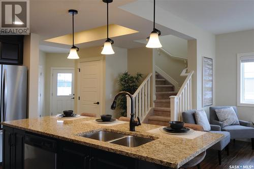 222 Schmeiser Bend, Saskatoon, SK - Indoor Photo Showing Kitchen With Double Sink