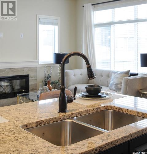 222 Schmeiser Bend, Saskatoon, SK - Indoor Photo Showing Kitchen With Double Sink