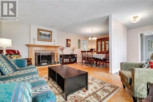 23 Banting Crescent, Ottawa, ON - Indoor Photo Showing Living Room With Fireplace