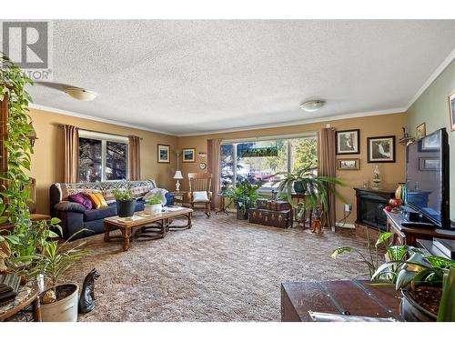 6580 Hwy 33 Highway, Beaverdell, BC - Indoor Photo Showing Living Room With Fireplace