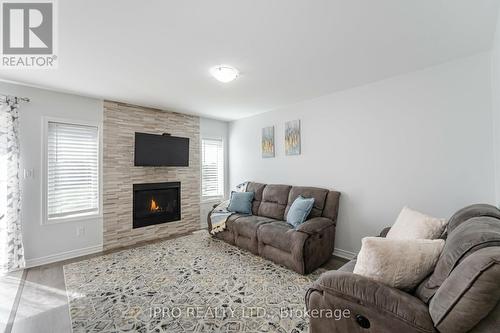 88 - 143 Ridge Road, Cambridge, ON - Indoor Photo Showing Living Room With Fireplace