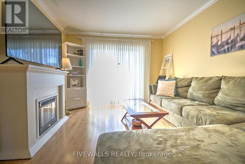 673 Woodcrest Boulevard, London, ON - Indoor Photo Showing Living Room With Fireplace