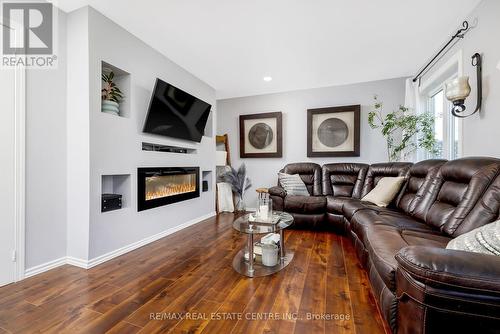 1595 Evans Terrace E, Milton, ON - Indoor Photo Showing Living Room With Fireplace