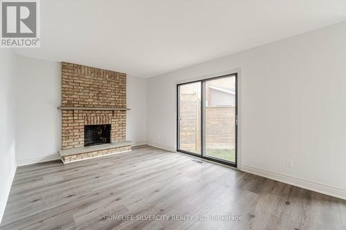 6602 Snow Goose Lane, Mississauga, ON - Indoor Photo Showing Other Room With Fireplace
