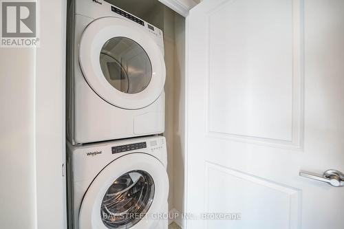 715 - 3200 William Coltson Avenue, Oakville, ON - Indoor Photo Showing Laundry Room