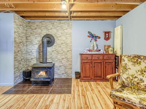 Salle familiale - 65 Rue David, Labelle, QC - Indoor With Fireplace