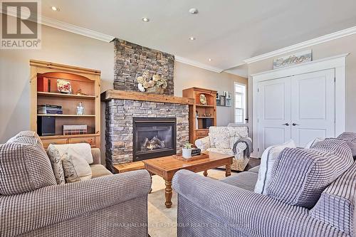 10 Queen Street, Kawartha Lakes, ON - Indoor Photo Showing Other Room With Fireplace