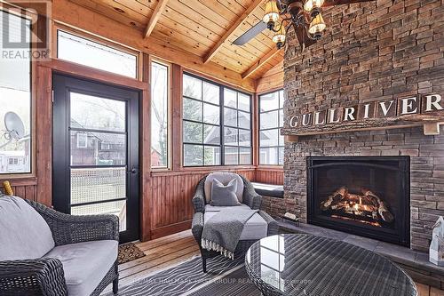 10 Queen Street, Kawartha Lakes, ON - Indoor Photo Showing Living Room With Fireplace