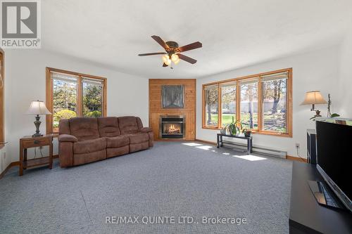 12112C Loyalist Parkway, Prince Edward County, ON - Indoor Photo Showing Living Room With Fireplace