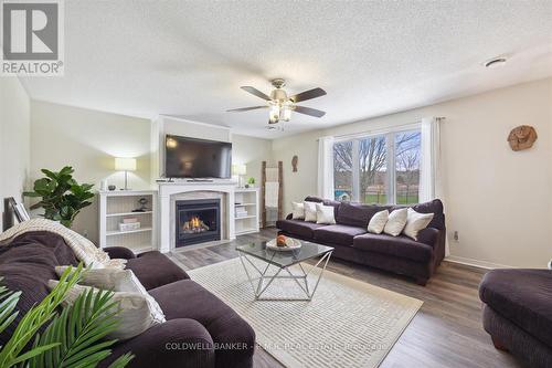 187 King Street E, Cramahe, ON - Indoor Photo Showing Living Room With Fireplace