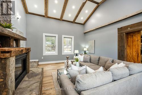 3300 Leach Road, Hamilton Township, ON - Indoor Photo Showing Living Room With Fireplace