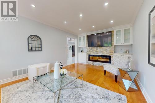 2012 Aldermead Road, Mississauga, ON - Indoor Photo Showing Living Room With Fireplace