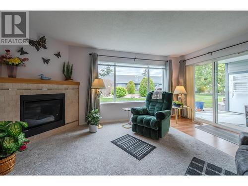 11523 Dunsdon Crescent Unit# 6, Summerland, BC - Indoor Photo Showing Living Room With Fireplace
