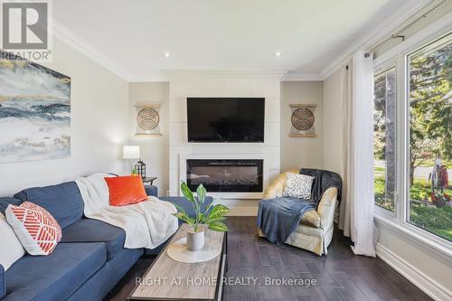 122 Clements Road E, Ajax, ON - Indoor Photo Showing Living Room With Fireplace