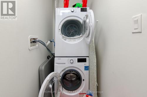 2209 - 50 Ordnance Street E, Toronto, ON - Indoor Photo Showing Laundry Room