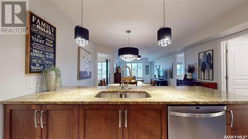 218 5303 Universal Crescent, Regina, SK - Indoor Photo Showing Kitchen With Double Sink