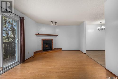182 - 184 Verbeke Road, Saskatoon, SK - Indoor Photo Showing Other Room With Fireplace