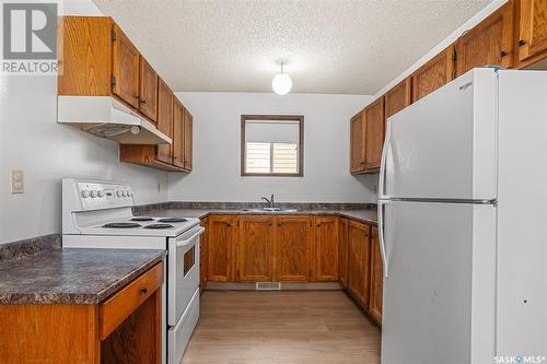 182 - 184 Verbeke Road, Saskatoon, SK - Indoor Photo Showing Kitchen With Double Sink