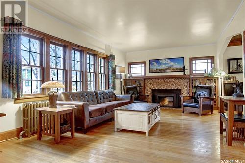 88 Angus Crescent, Regina, SK - Indoor Photo Showing Living Room With Fireplace