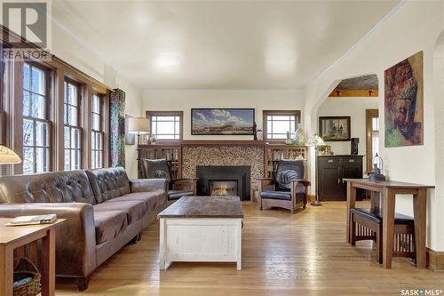 88 Angus Crescent, Regina, SK - Indoor Photo Showing Living Room With Fireplace