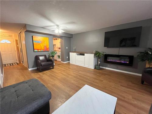 350 Quigley Road|Unit #812, Hamilton, ON - Indoor Photo Showing Living Room With Fireplace
